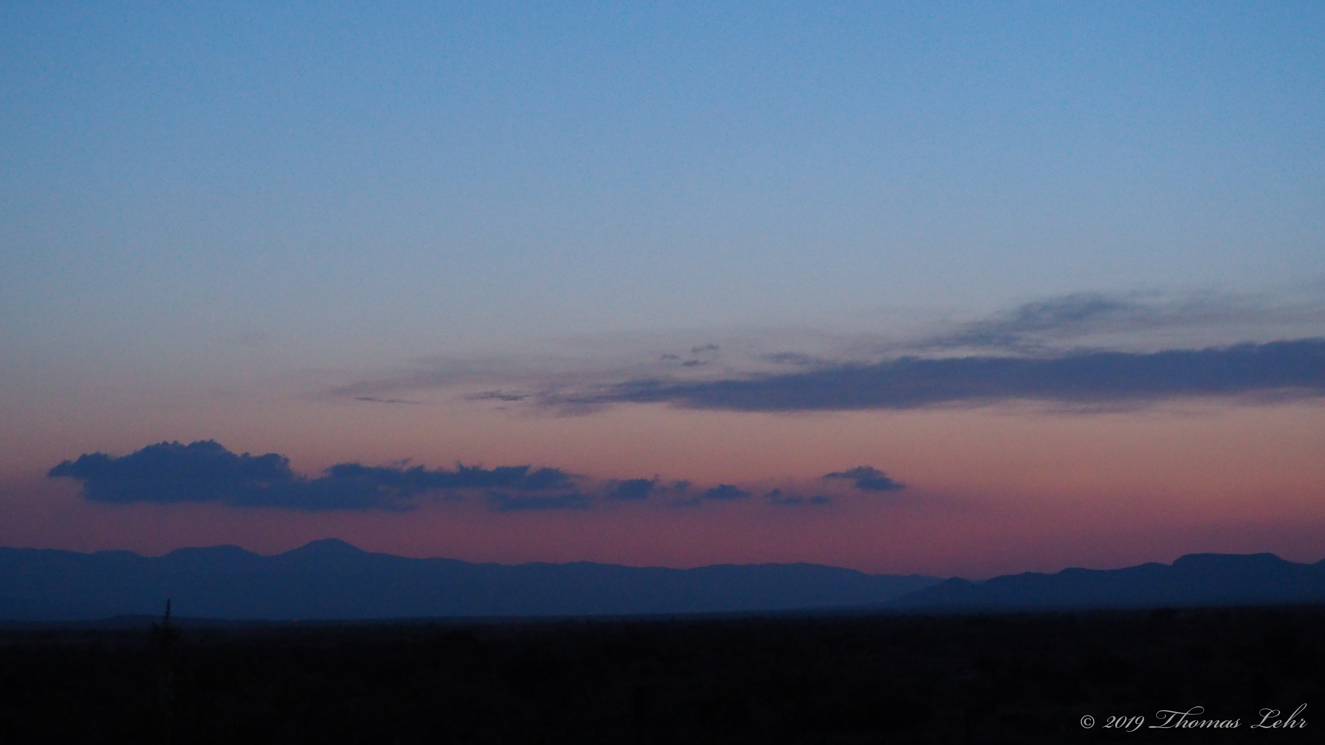 We stand up, familiar to ourselves,