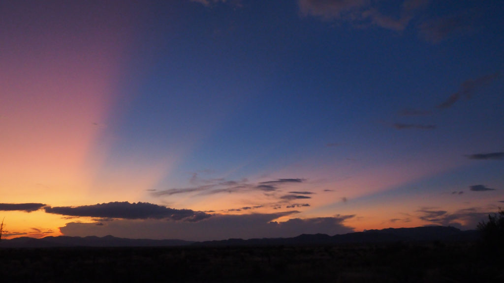 And in the trembling blue-green of the sky