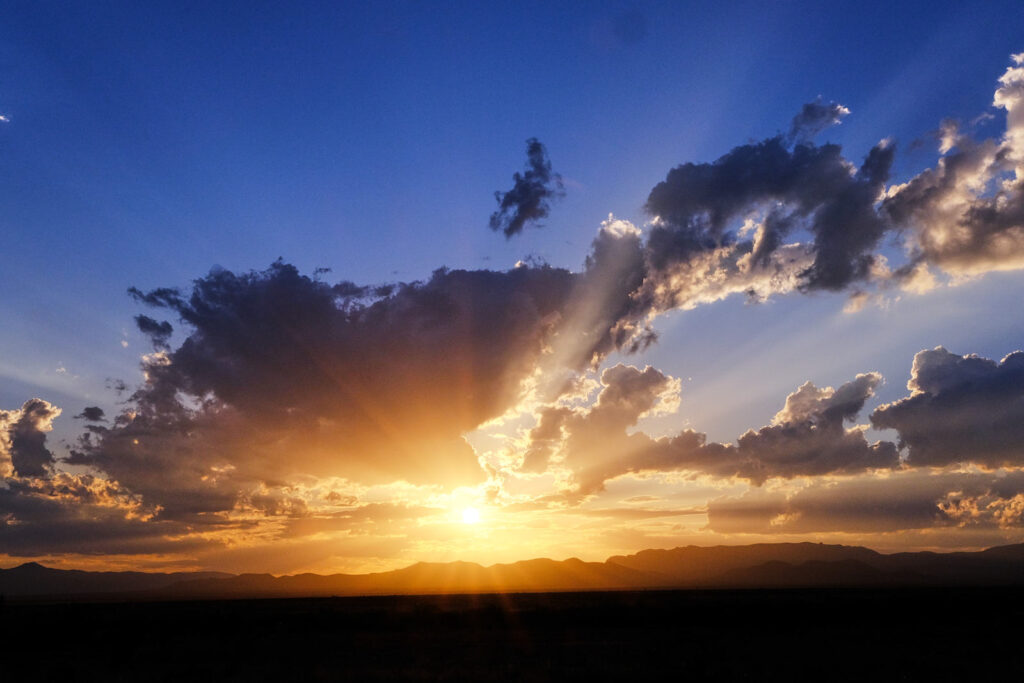 Like a tower from which two or three bricks fall to the sidewalk,