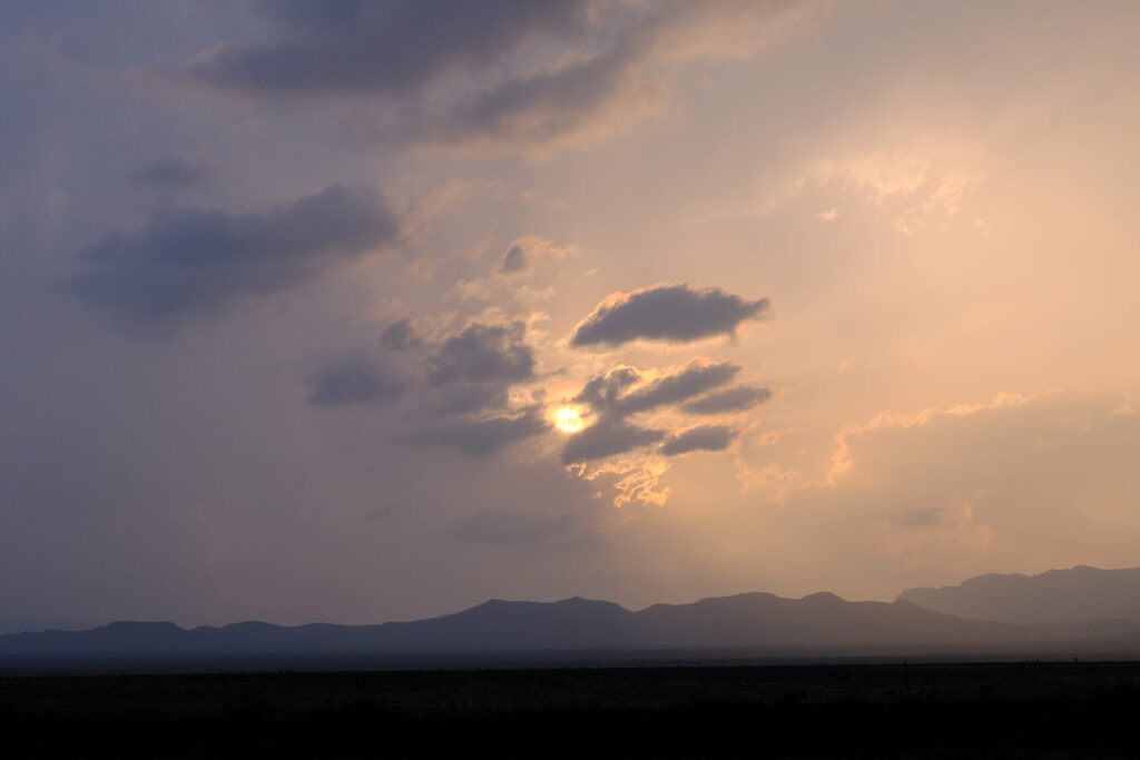 Someone standing: as a drink through thirst