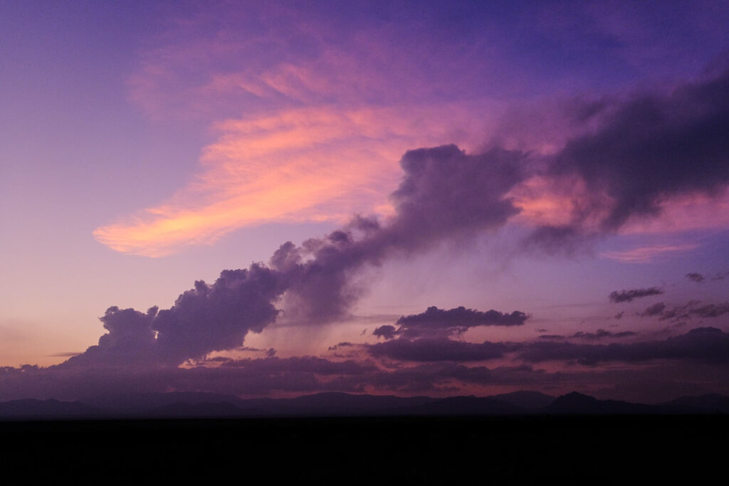 as from a cloud suspended,