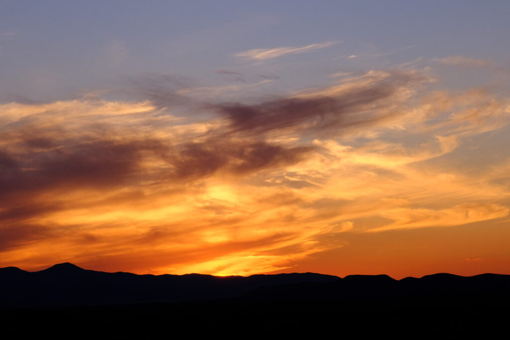 Be the ground lying under that sky.