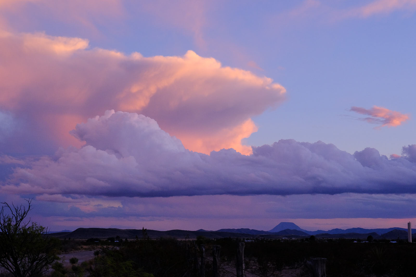 tell the clowned-out clouds and the rain,